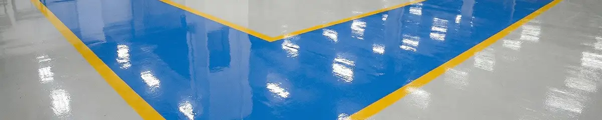 A factory floor professionally covered and marked with epoxy flooring in Cleveland, OH