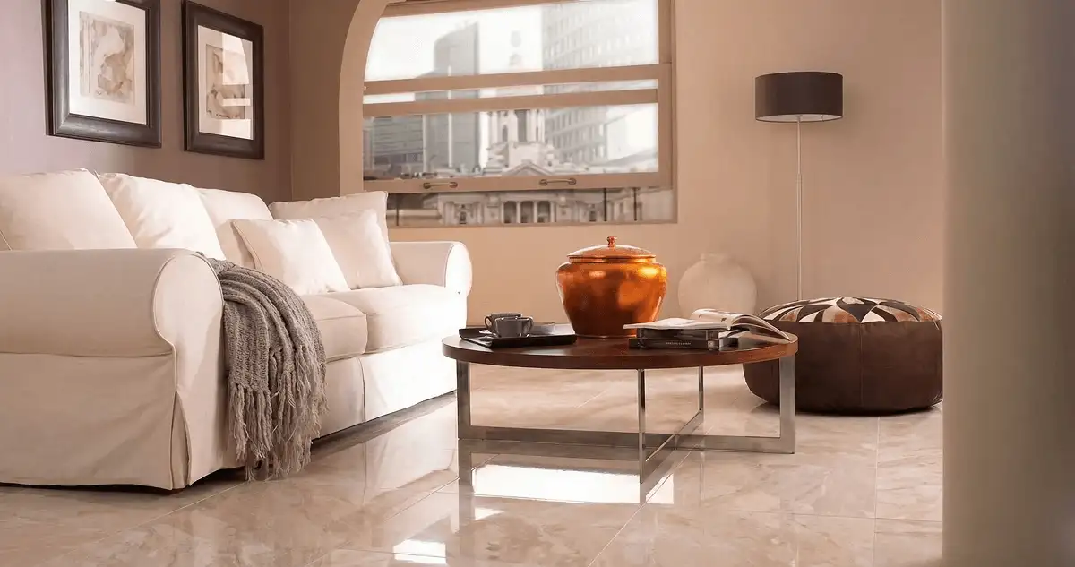 Modern living room with professionally installed marble flooring, a beige sofa, coffee table in Cleveland, OH