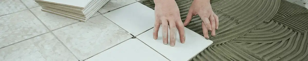 Professional installing white tile floors in Cleveland, OH