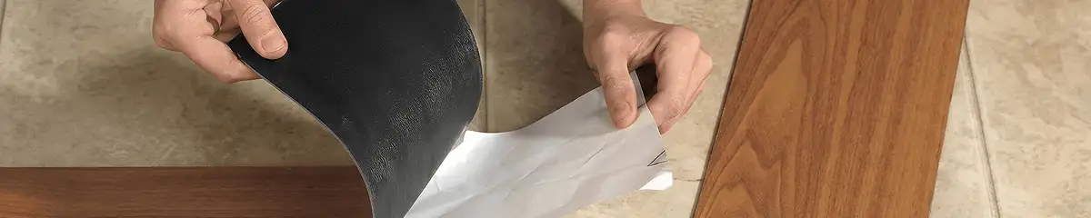 A professional installing vinyl flooring in Cleveland, OH